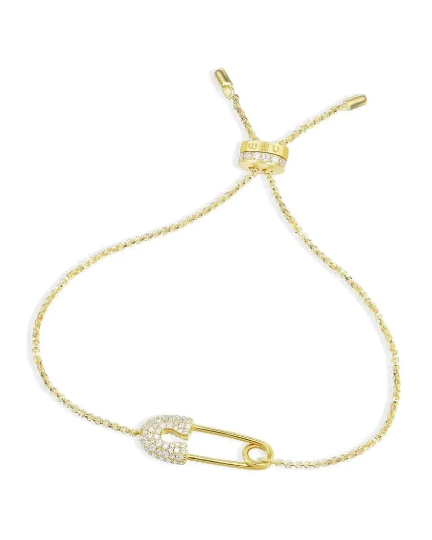 Bracelet APM Monaco ajustable épingle cristaux zirconium plaqué or jaune femme